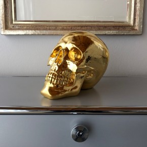 Schädel in 24 Karat Gold